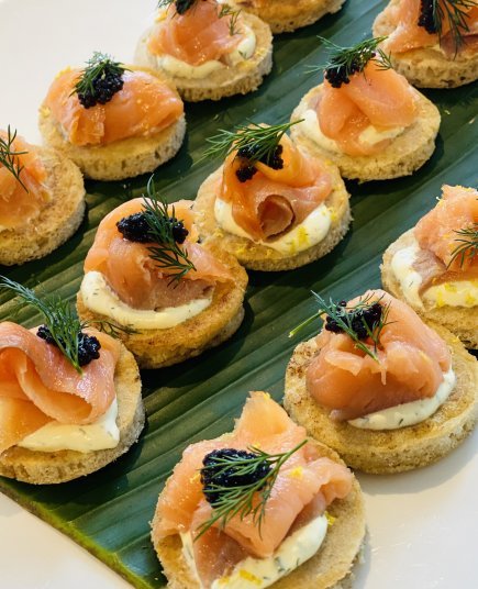Blinis with smoked salmon, creme friache, dill & roe